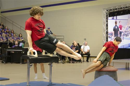 two boys do gymnastics